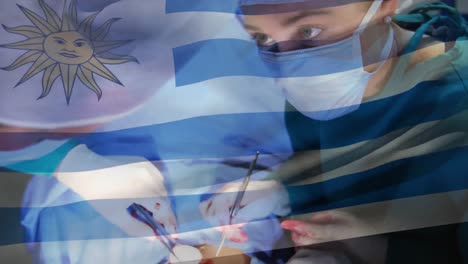 animation of flag of uruguay waving over surgeons in operating theatre
