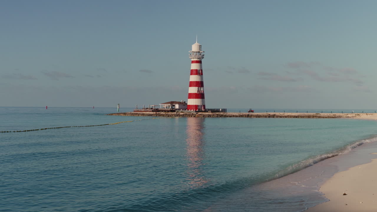 Colorful Lighthouse on a Tropical Island Beach