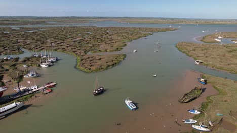 aerial panoramic view of boats mooring in tollesbury marina with salt marshes in essex, united kingdom