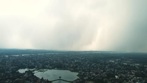 aerial view of murshidabad, focusing on the river and the city’s colonial-era architecture.