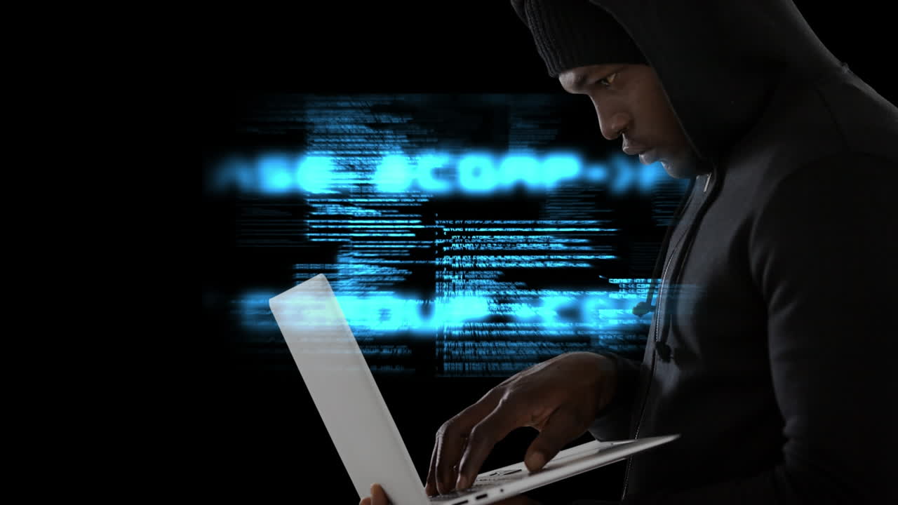Typing on laptop, person with hoodie over digital code animation