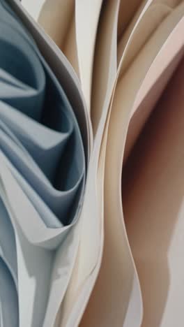 abstract flowing curves and waves in soft pastel hues