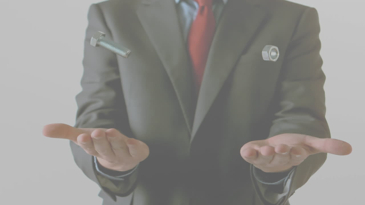 animación de tornillo y tuerca sobre las manos del hombre de negocios