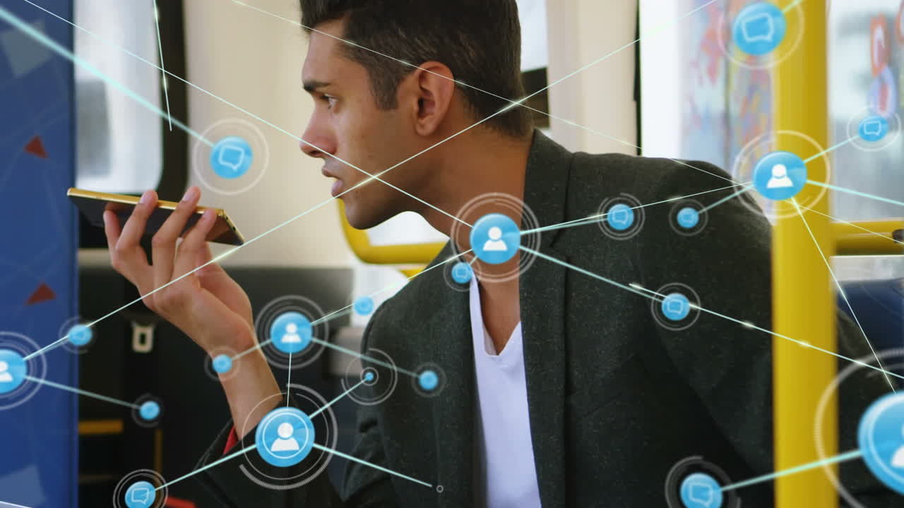 Animation of network of connections with icons over caucasian man using smartphone