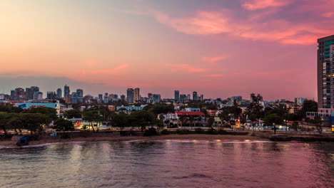 beautiful sideways hyperlapse timelapse of santo domingo malecon seafront at sunset