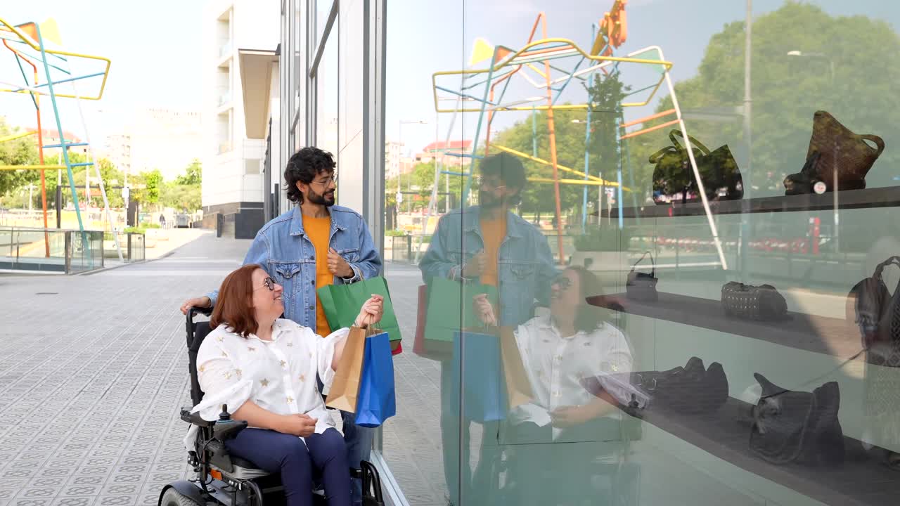 A woman in a wheelchair shopping with a friend
