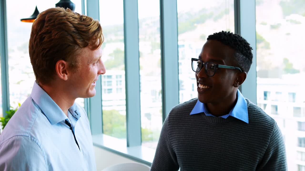 Executives interacting with each other in meeting