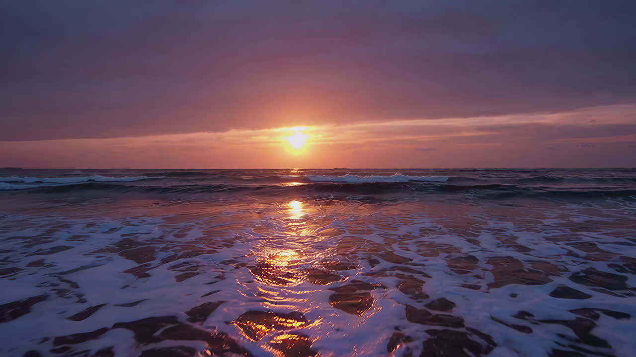 Sunrise or Sunset over the Ocean with Waves