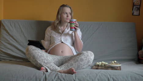 pregnant woman spending time at home