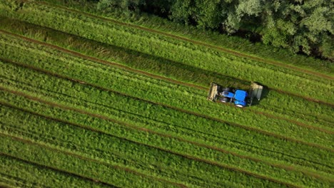 aerial view of tractor mowing a field