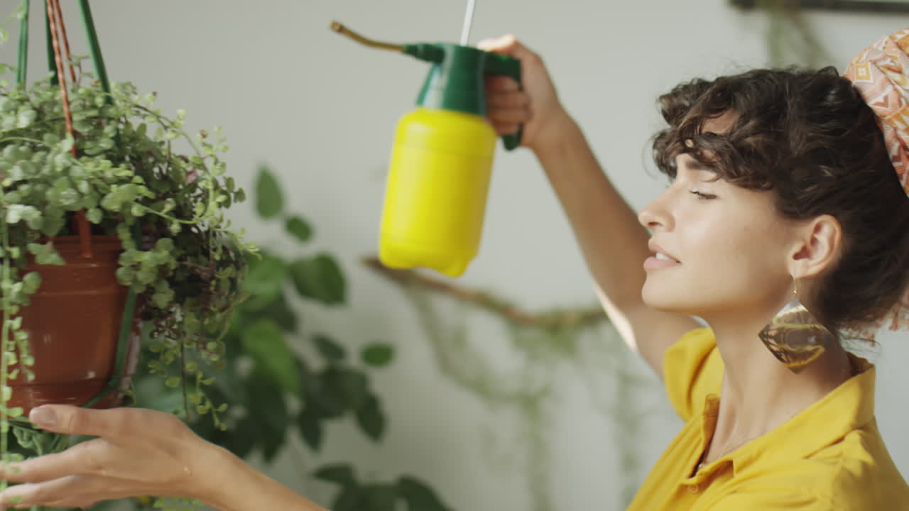 Girl Caring for Indoor Houseplants
