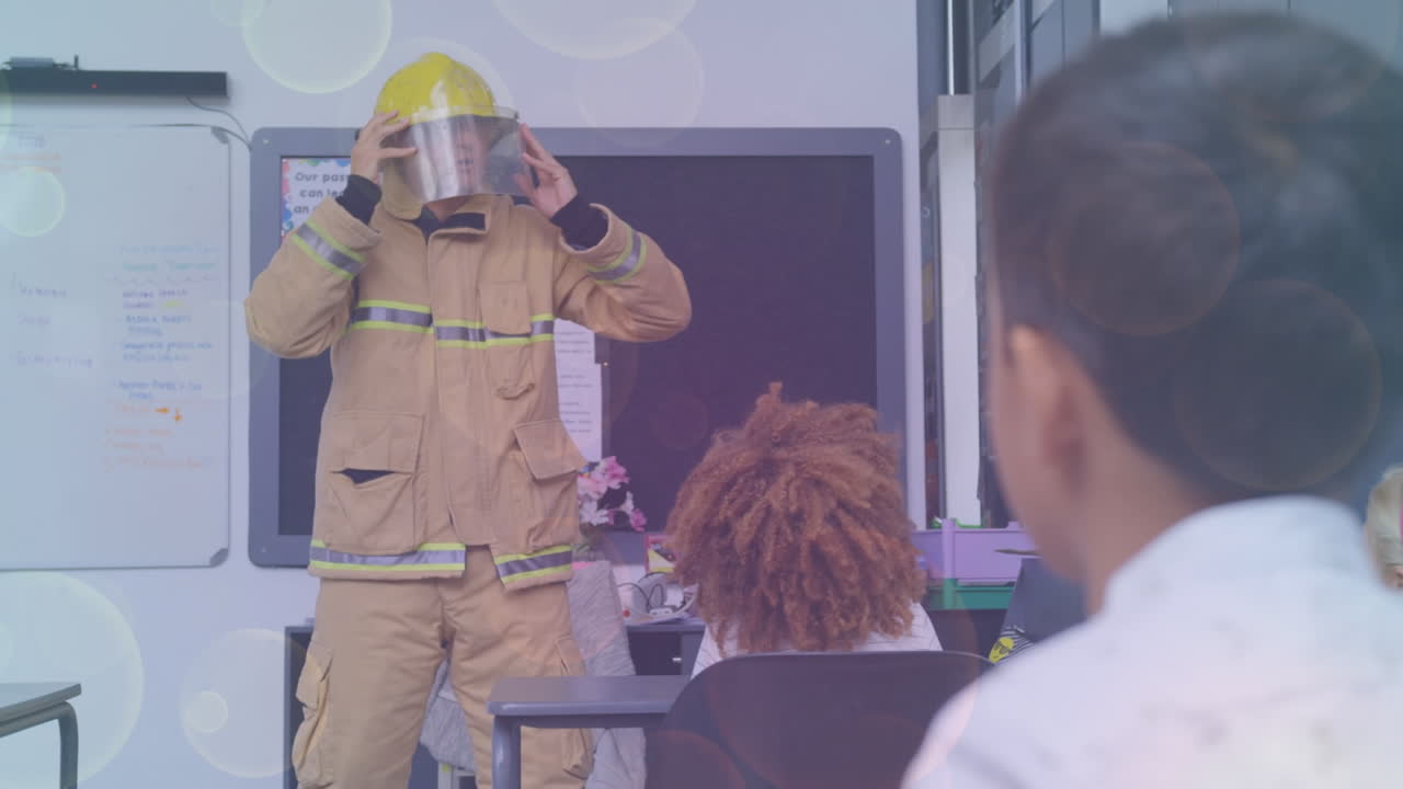 Animation of lights over caucasian fireman making presentation to class of diverse pupils