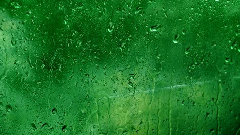 wet glass background water drops green window