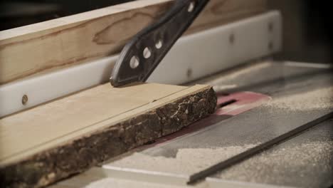 cutting wooden plank by electric circular saw in 4k