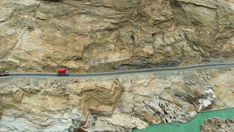 trucks driving on jsr road in skardu, pakistan