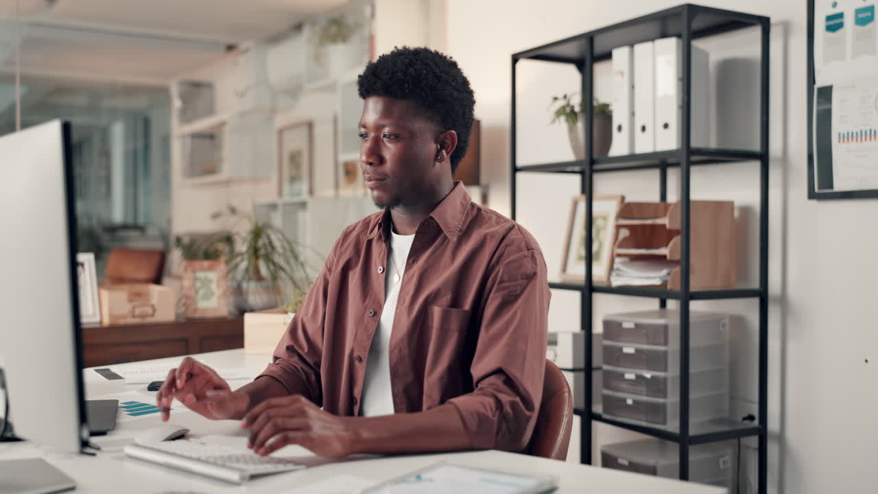 Relaxed Black Man in Office