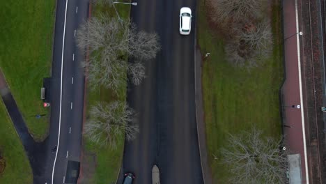 Aerial-view-of-cars-driving-by-in-Gothenburg,-Sweden