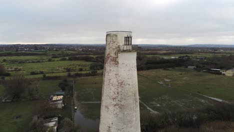 historic leasowe lighthouse maritime beacon landmark aerial coastal countryside wirral view close rising to birdseye