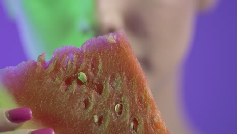 Close-Up-Of-Woman's-Face-and-Mouth,-Eating-Watermelon-and-Licking-Lips