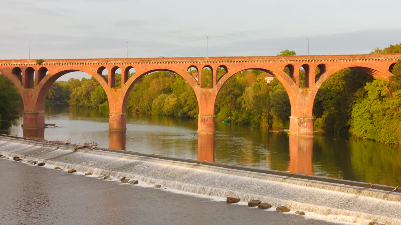 Footage showing Tarn river under historic bridge linking both parts of Albi in France