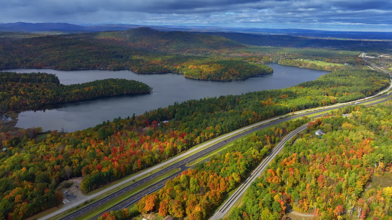 Vast woodlands, lakes and mountains the north of New York state. Aerial perspective on the beautiful nature in autumn. Aerial view.