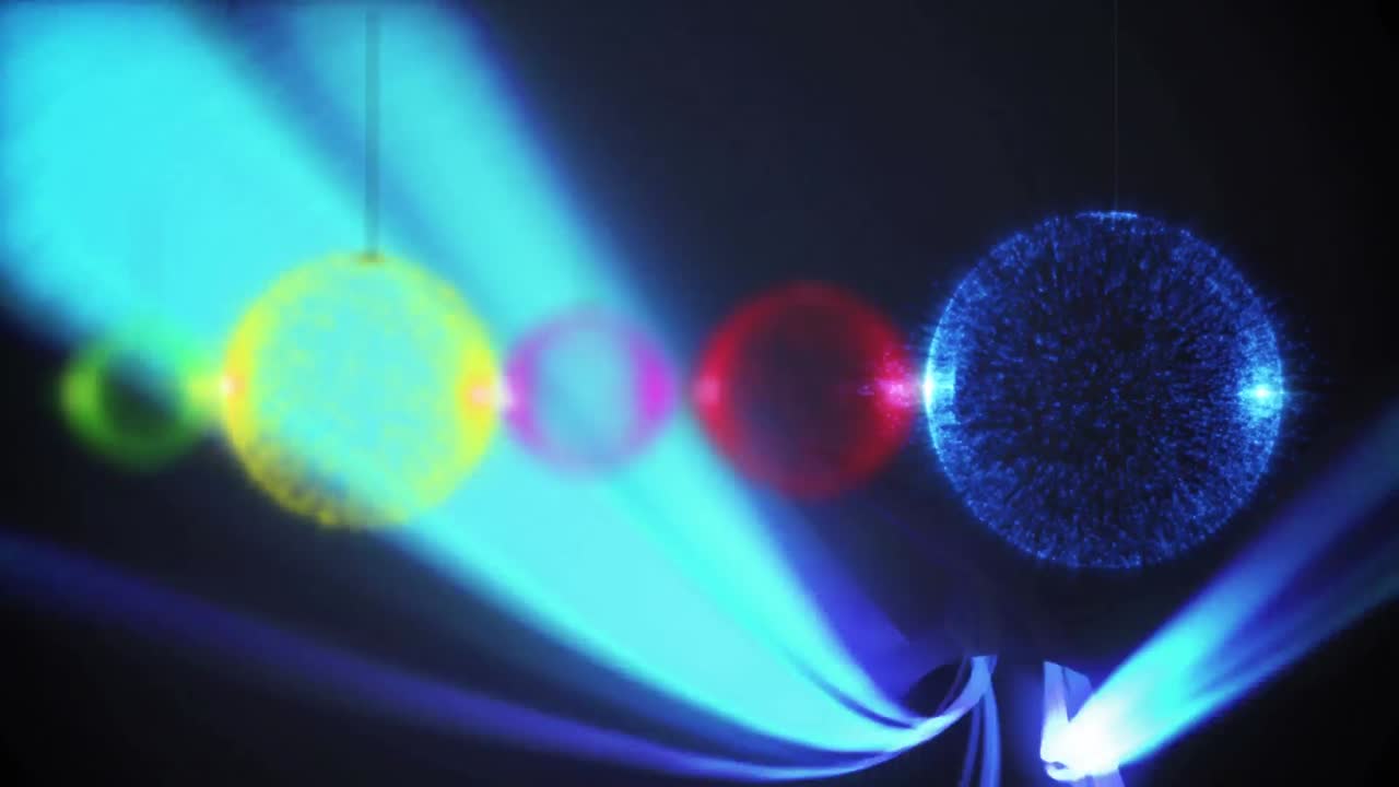 animación de puntos coloridos sobre senderos azules sobre fondo negro