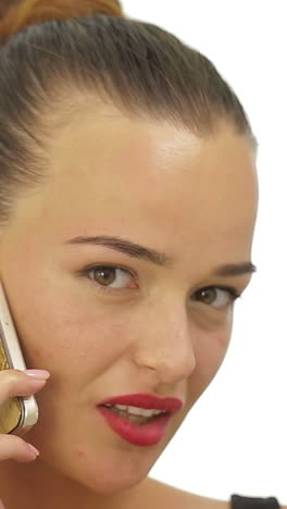 woman talking on mobile phone. beautiful brunette young woman speaking by mobile phone