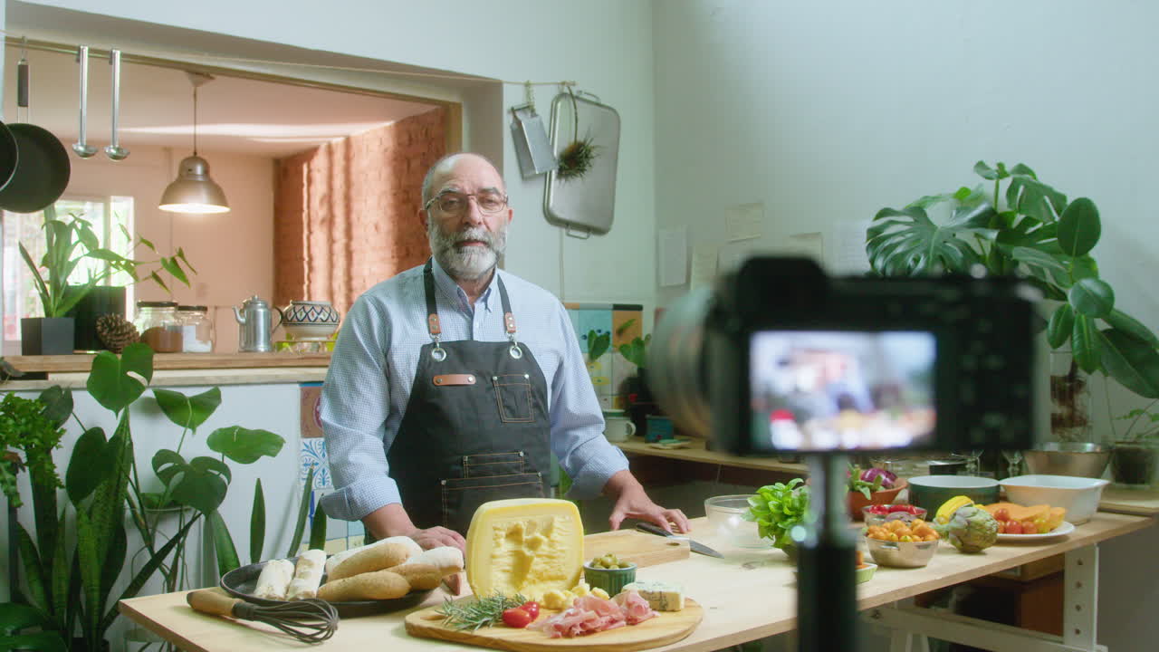 Chef preparing a food platter for the camera