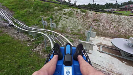 The-descent-begins-after-the-climb-at-the-start-of-a-summer-toboggan-run