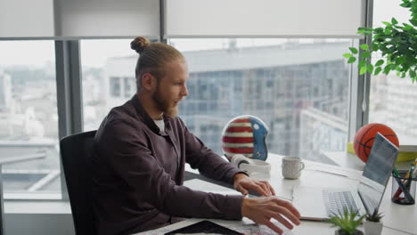 focused student talking computer virtual meeting closeup. man studying online