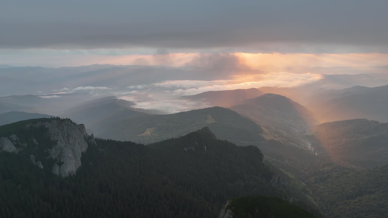 Majestic Sunset over Misty Mountains