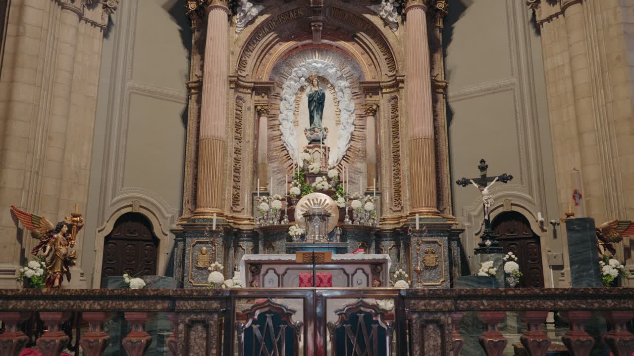 grand church altar with statue of virgin mary and decorative architecture