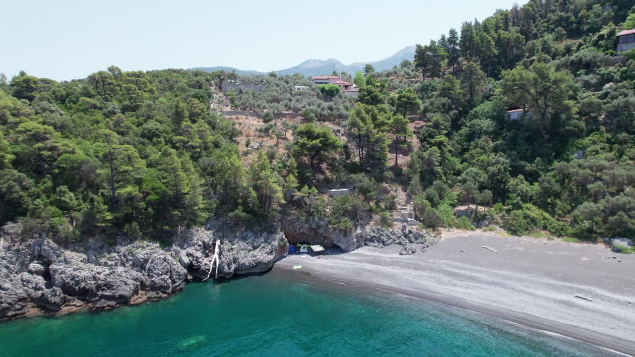Evoia island Greece summer holiday destination in europe drone reveal beach and cliff in wilderness