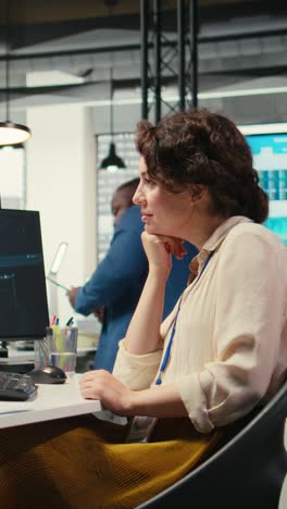 vertical video cheerful businesswoman being proud of good infographics with ai tools