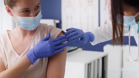 video of woman during vaccination in a doctor's office