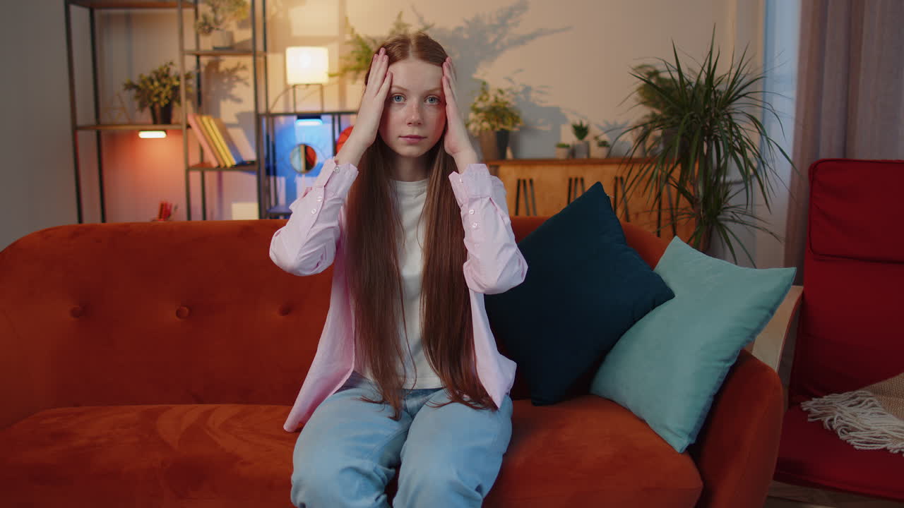 Upset redhead girl making face palm gesture, feeling bored, disappointed in fail bad results news