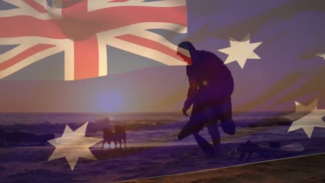 Animation-of-flag-of-australia-over-caucasian-man-with-dogs-at-beach