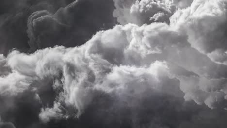 dark cumulonimbus clouds moving in the dark sky, point of view