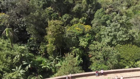 drone flying over nine arch bridge train tracks in sri lanka