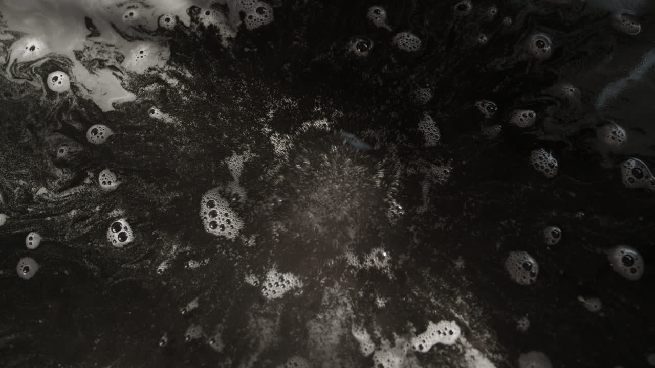 Dark soapy water bubbles