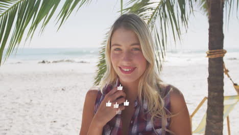 on beach, woman surrounded by floating thumbs-up icons in animation