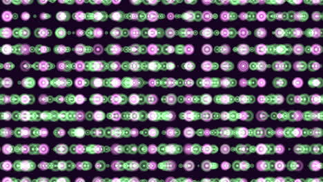 purple and green circle pattern on black background