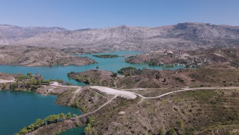 green lake and surrounding mountains in oymapınar, manavgat dam, antalya province, turkey