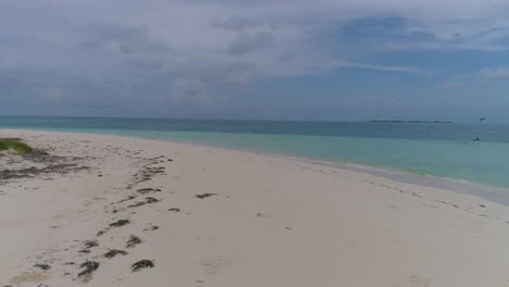 POV-walking-toward-lonely-calm-beach-caribbean-island,-tranquil-mind,-Los-Roques