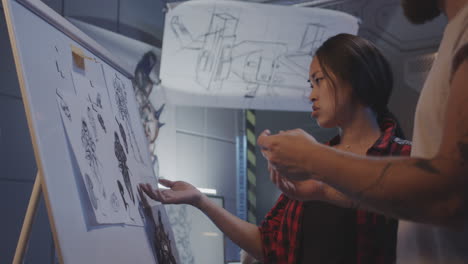 team of designers collaborating on concept art