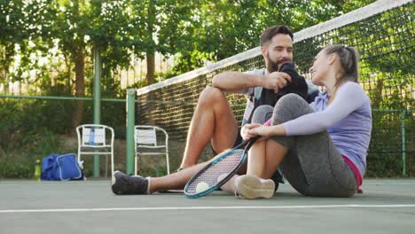 video of happy caucasian couple on having break the court