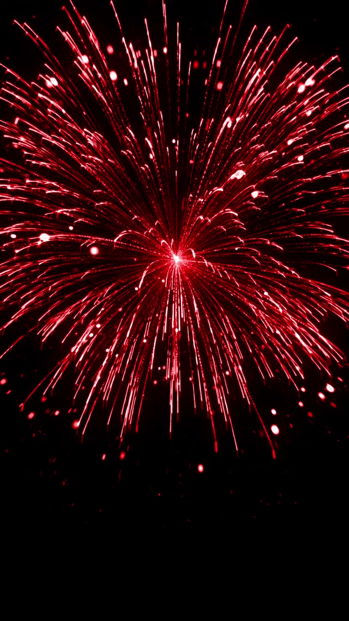Vertical red firework rain with long falling trails. Atmospheric holiday animation for social media stories and reels