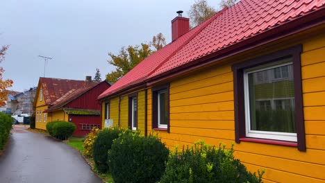 yellow baltic traditional houses in small village of birstonas lithuania