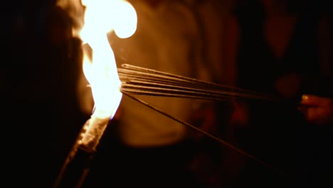 multiple sparklers getting lit together