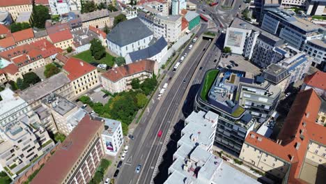 aerial view of bratislava castle and old town during the day, drone aerial view 4k establishing shot of the slovakian european capital city during the summer, stunning view of the landmark